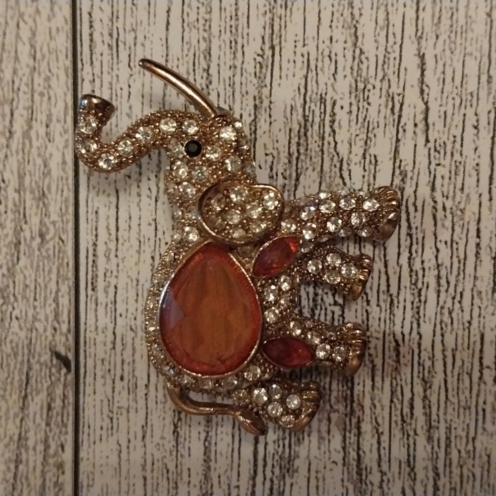 Orange and crystal elephant pin
